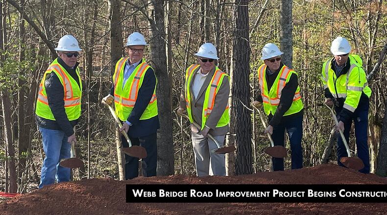 Alpharetta officials and staff gathered March 13 to break ground on two phases of the five-phase Webb Bridge Road Improvement Project. COURTESY CITY OF ALPHARETTA
