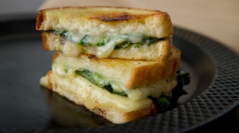 Preserves of some kind are often an accompaniment on cheese plates. Here the idea is borrowed for a grilled sandwich. Sweet/savory onion jam, your own or store-bought, cozies up to a soft Italian cheese. (Alex Garcia/Chicago Tribune/TNS)