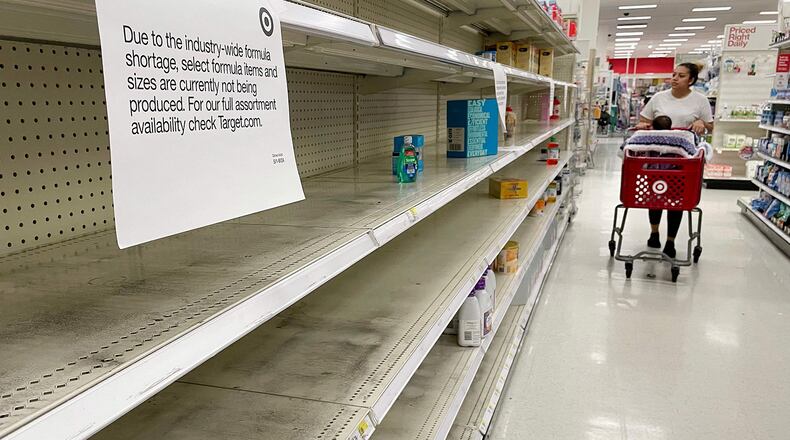 A woman shops for baby formula at Target in Annapolis, Maryland, on May 16, 2022, as a nationwide shortage of baby formula continues due to supply chain crunches tied to the coronavirus pandemic that have already strained the country's formula stock, an issue that was further exacerbated by a major product recall in February. (Jim Watson/AFP via Getty Images/TNS)