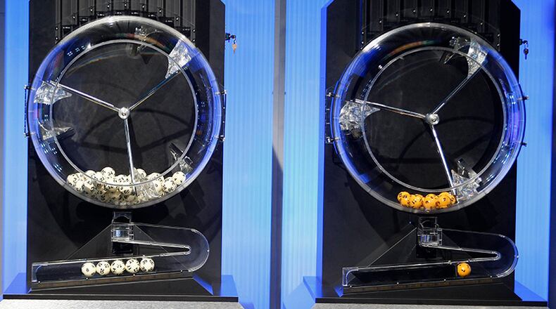 The numbers drawn in the $636 million Mega Millions lottery were 8, 14, 17, 20 and 39 -- and the Mega Ball 7.