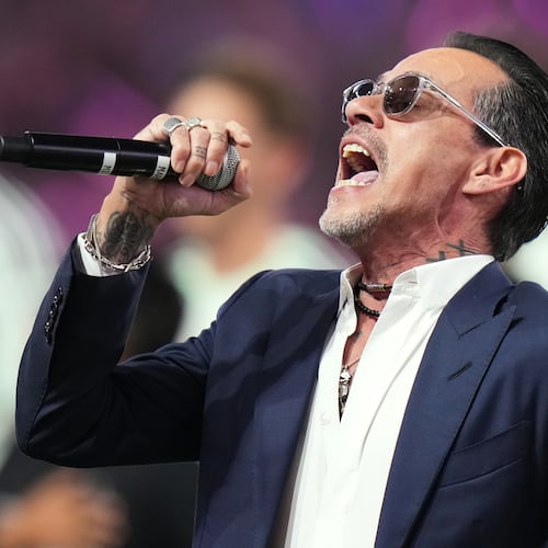 FILE - Marc Anthony performs the national anthem before an MLS soccer match between Inter Miami CF and Austin FC in Miami, April 4, 2026. (AP Photo/Lynne Sladky, File)