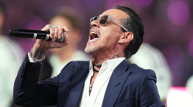 FILE - Marc Anthony performs the national anthem before an MLS soccer match between Inter Miami CF and Austin FC in Miami, April 4, 2026. (AP Photo/Lynne Sladky, File)