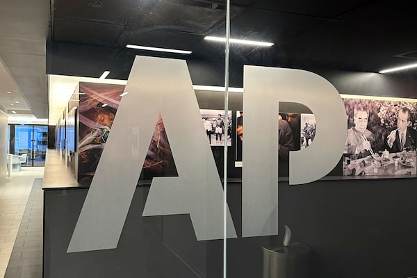 The Associated Press logo is displayed at the news organization's world headquarters in New York on Wednesday, April 9, 2025. (AP Photo/Aaron Jackson)
