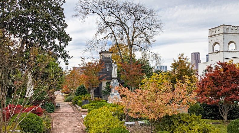 Authorities are investigating after two Confederate statues were vandalized overnight in Atlanta's Oakland Cemetery.