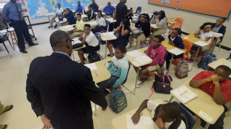 DeKalb County School District Superintendent Steve Green visits with students. AJC FILE PHOTO
