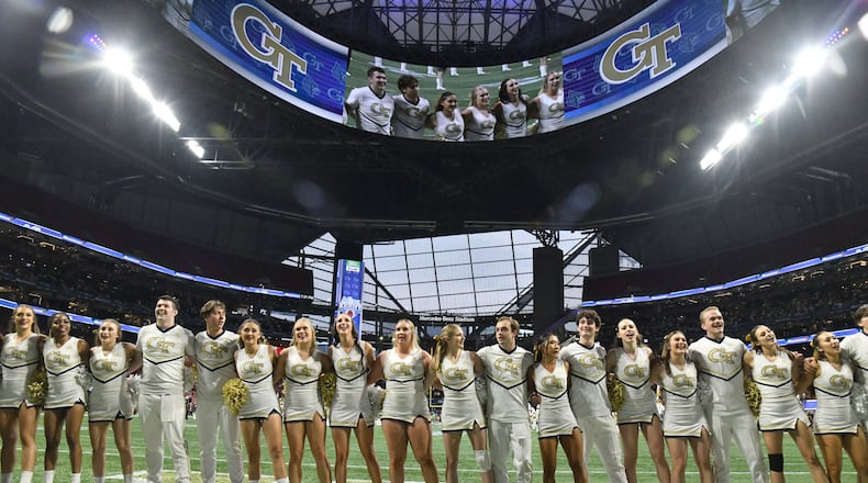 Georgia Tech's cheerleaders sing before the start of the inaugural Aflac Kickoff Game against Louisville at Mercedes-Benz Stadium, Friday, September 1, 2023, in Atlanta. (Hyosub Shin / Hyosub.Shin@ajc.com)