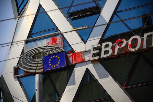 Red paint from pro-Russian protests remain visible on the European Parliament and European Commission building in Sofia, Bulgaria, Monday, June 2, 2025. (AP Photo/Valentina Petrova)