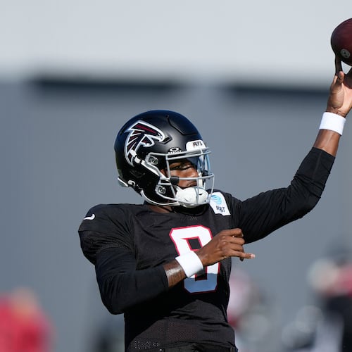 Atlanta Falcons quarterback Michael Penix Jr. (9) runs drills during an NFL football training camp practice on Monday, Aug. 17, 2026, in Flowery Branch, Ga. (AP Photo/Brynn Anderson)