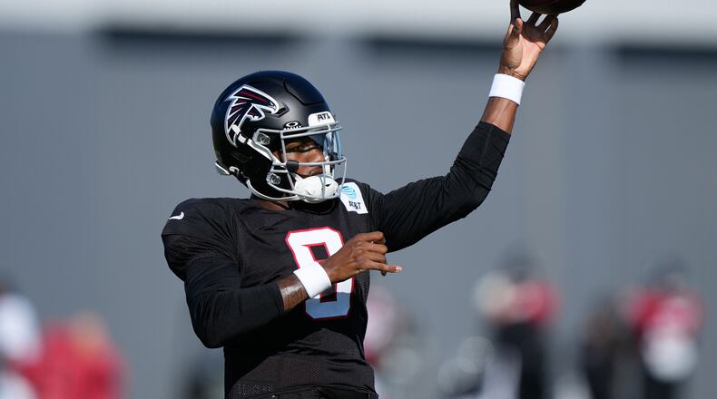 Atlanta Falcons quarterback Michael Penix Jr. (9) runs drills during an NFL football training camp practice on Monday, Aug. 17, 2026, in Flowery Branch, Ga. (AP Photo/Brynn Anderson)