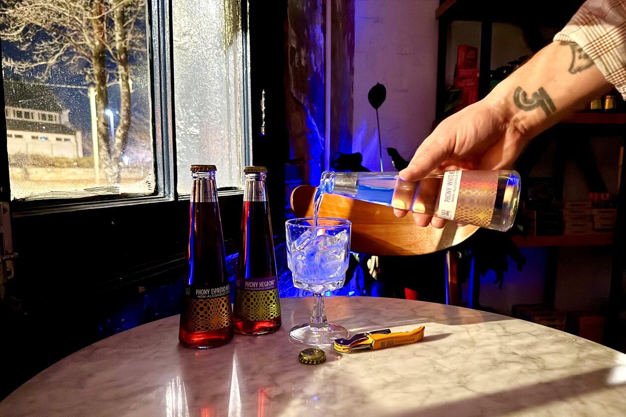 Non-alcoholic cocktails, like this Phony White Negroni from St. Agrestis, are here to stay in 2026, according to columnists Jerry and Krista Slater. (Krista Slater for the AJC)