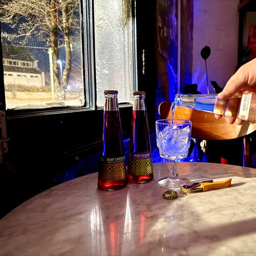 Non-alcoholic cocktails, like this Phony White Negroni from St. Agrestis, are here to stay in 2026, according to columnists Jerry and Krista Slater. (Krista Slater for the AJC)