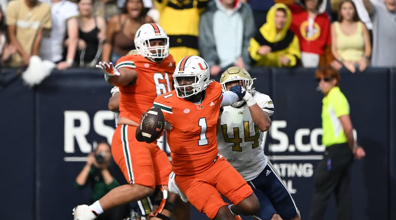 Georgia Tech linebacker Kyle Efford (44) sacks Miami quarterback Cam Ward during the second half of an NCAA college football game at Georgia Tech's Bobby Dodd Stadium, Saturday, November 9, 2024, in Atlanta. Georgia Tech won 28-23 over Miami. (Hyosub Shin / AJC)