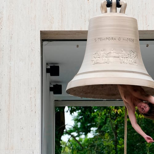 EDS NOTE: NUDITY - A performer rings a bell with her body at the Austrian pavilion called 'Seaworld Venice' by artist Ei Arakawa-Nash, at the Venice 2026 Biennale Art, in Venice, Italy, Thursday, Nov. 14, 2024. (AP Photo/Luca Bruno)