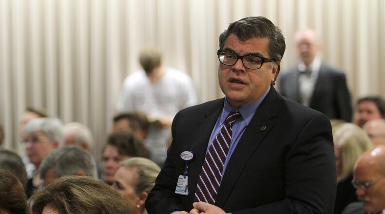 Ricardo Azziz was the top paid University System employee in fiscal 2016 even though he’d resigned as president of Augusta University the year before. VINO WONG / VWONG@AJC.COM