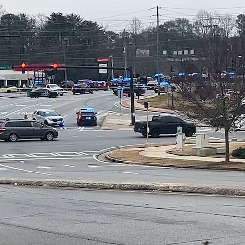A person was injured following an officer-involved shooting that led to a large police presence in Sandy Springs on Thursday, authorities said. (Channel 2 Action News)