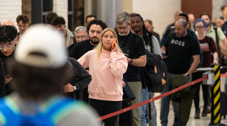 Travelers wait in multihour lines Friday for domestic security at Hartsfield-Jackson Atlanta International Airport amid the ongoing partial government shutdown. (Ben Hendren for the AJC)