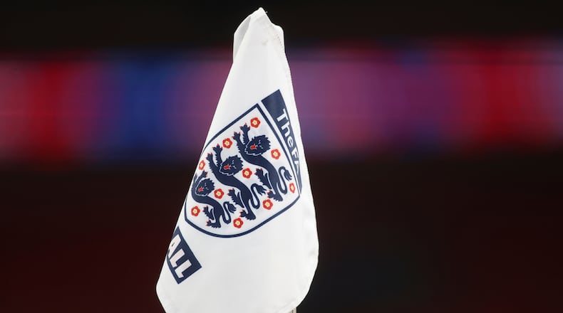 FILE - A corner flag with the England logo on it ahead of the World Cup 2022 group I qualifying soccer match between England and San Marino at Wembley stadium in London, Thursday March 25, 2021. (Carl Recine/Pool Photo via AP, File)