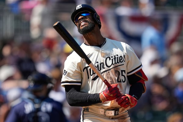 Minnesota Twins' Byron Buxton reacts after hitting a foul out to end the bottom of the ninth inning of a baseball game against the Tampa Bay Rays, Sunday, July 6, 2025, in Minneapolis. (AP Photo/Abbie Parr)