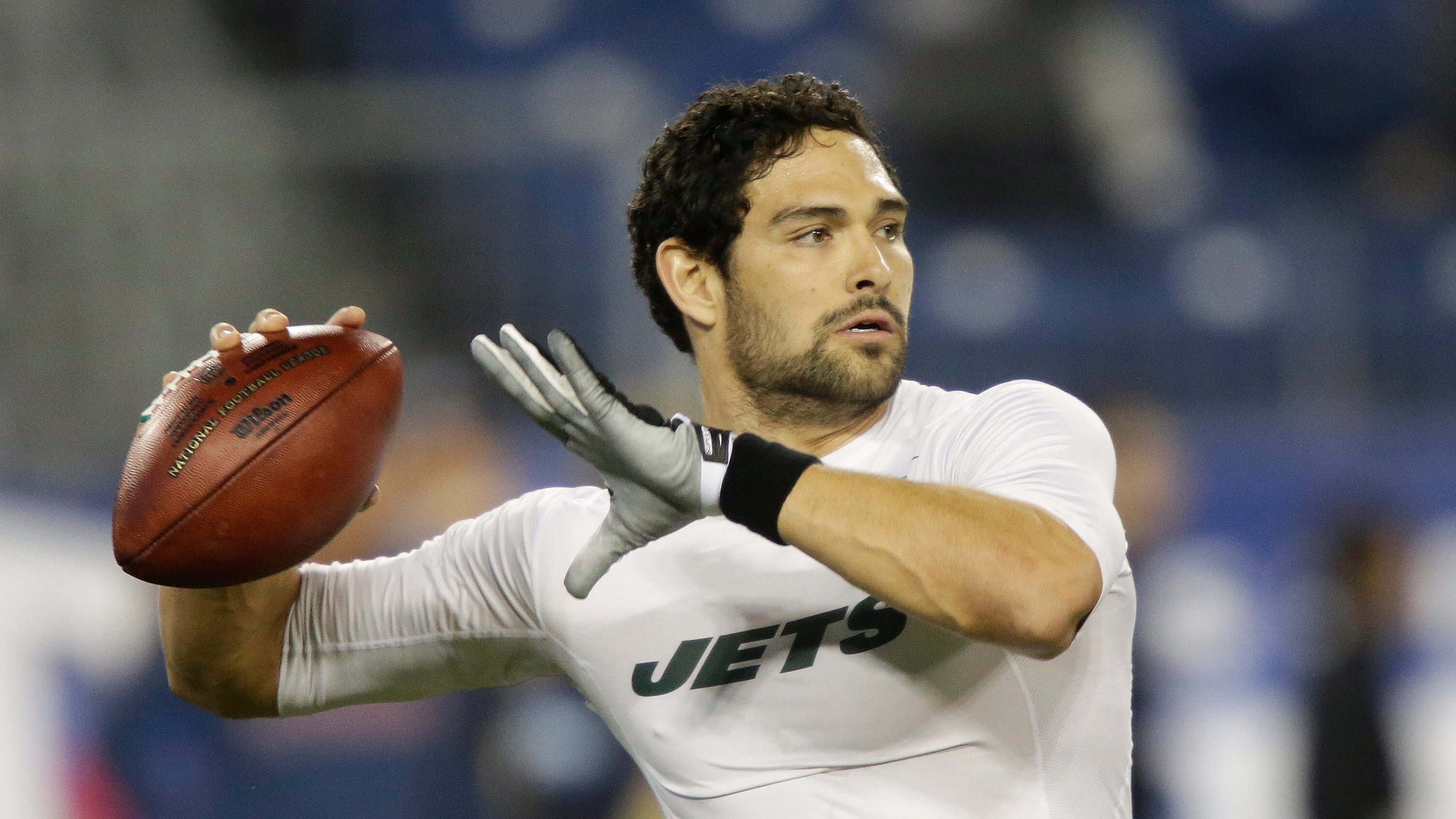 FILE - New York Jets quarterback Mark Sanchez warms up before an NFL football game between the Jets and the Tennessee Titans on Monday, Dec. 17, 2012, in Nashville, Tenn. (AP Photo/Wade Payne, File)