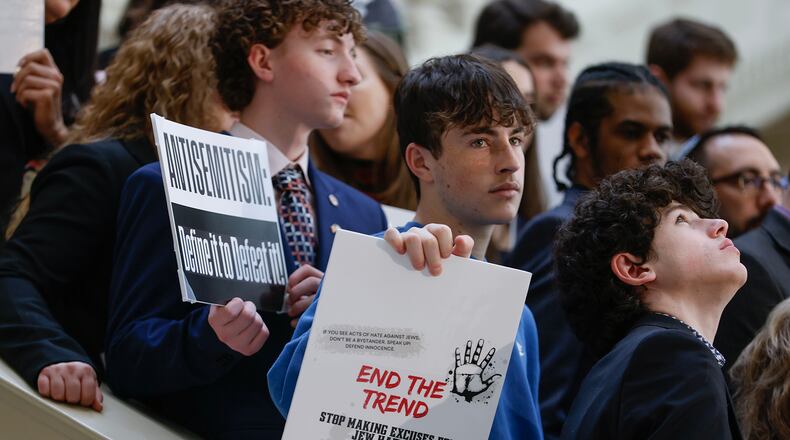 Members of the Jewish community and supporters hold signs during an antisemitism press conference at the Georgia State Capitol on Wednesday, Feb. 22, 2023. (Natrice Miller/Atlanta Journal-Constitution/TNS)