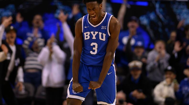 BYU forward AJ Dybantsa reacts to scoring a career high and new freshman record at BYU during the second half of an NCAA college basketball game against Utah, Saturday, Jan. 24, 2026, in Provo, Utah. (AP Photo/Tyler Tate)