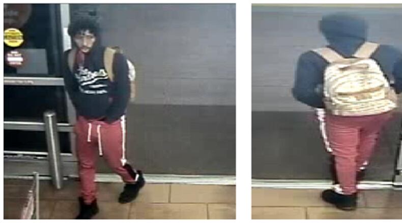 Gwinnett County police are looking for this man, who they believe robbed a woman at gunpoint in a Walmart parking lot around 2 a.m. April 10.