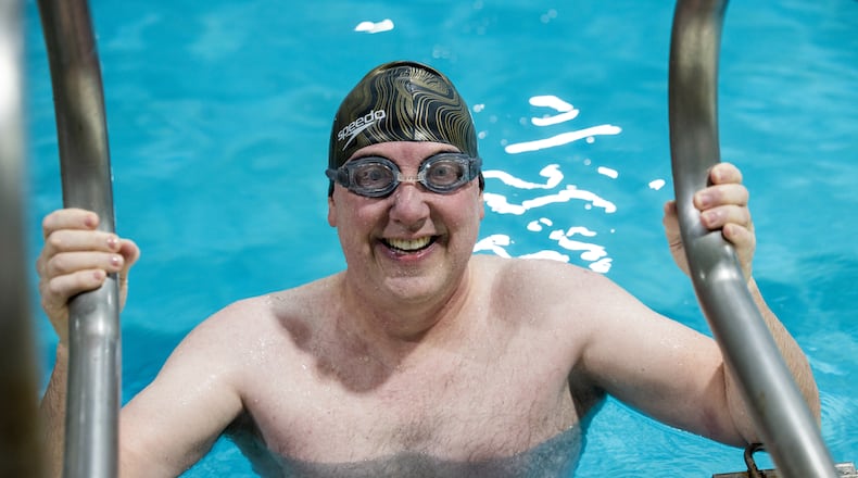 Jim Whitcomb trains swimming laps at the Mountain View Aquatic Center in Marietta. In September he will participate in a 13.1-mile Mega-Swim Challenge to raise money for Tunnel 2 Towers, which supports military, first responders and their families. PHIL SKINNER FOR THE ATLANTA JOURNAL-CONSTITUTION.