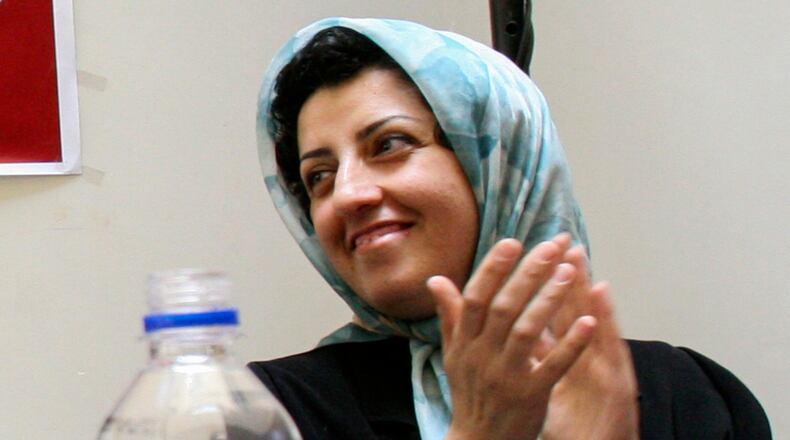 FILE - Prominent Iranian human rights activist Narges Mohammadi is seen in a meeting on women's rights in Tehran, Iran, on July 3, 2008. (AP Photo/Vahid Salemi, File)
