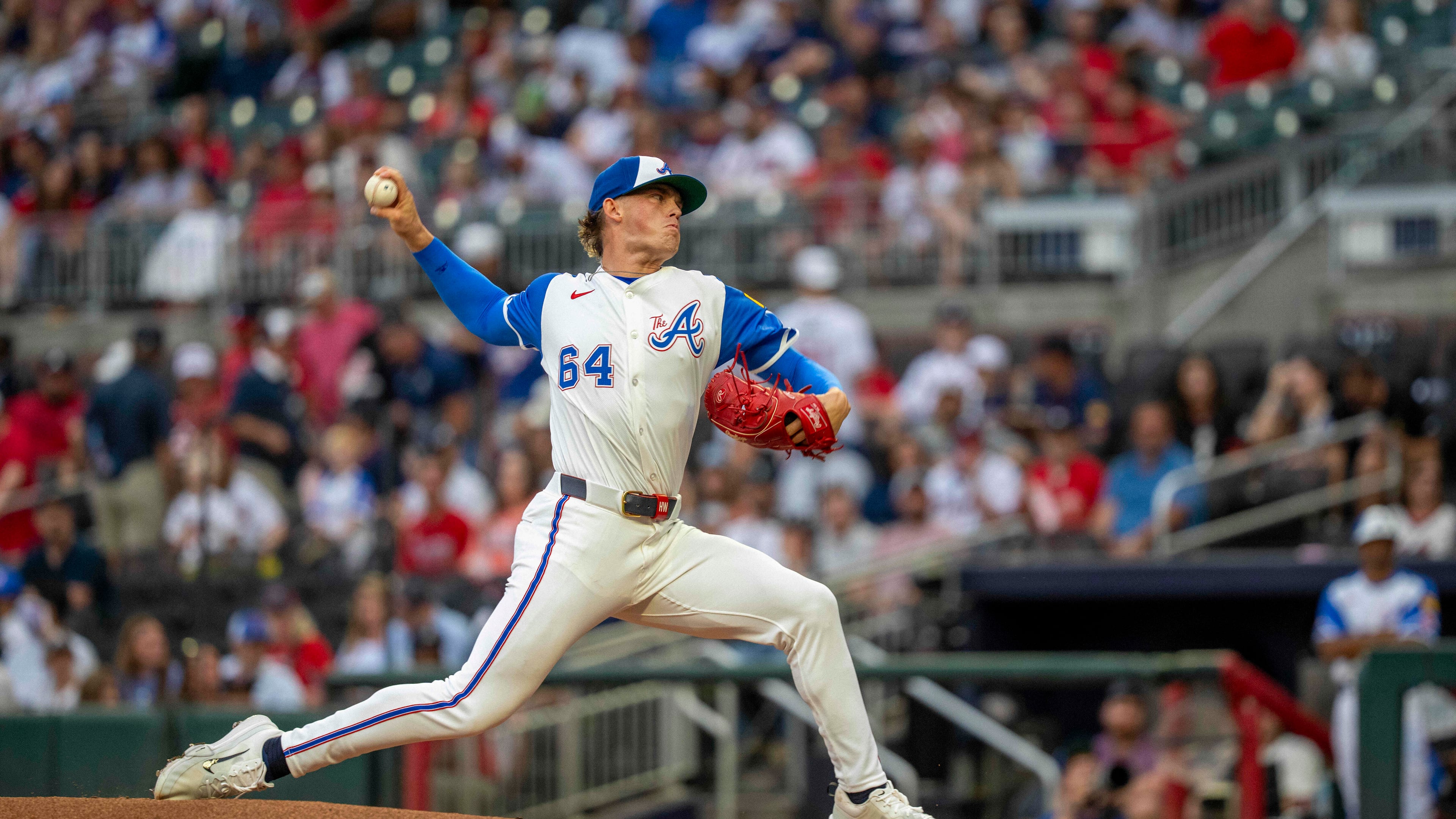 Atlanta Braves pitcher Hurston Waldrep (64) throws the first pitch during the first inning of a baseball game against the Seattle Mariners Saturday, Sept. 6, 2025, in Atlanta. (AP Photo/Erik Rank)