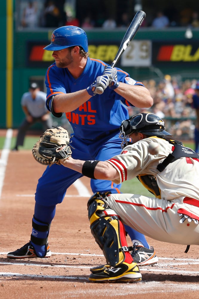 Bright blue and bright orange collide on Mets uniforms