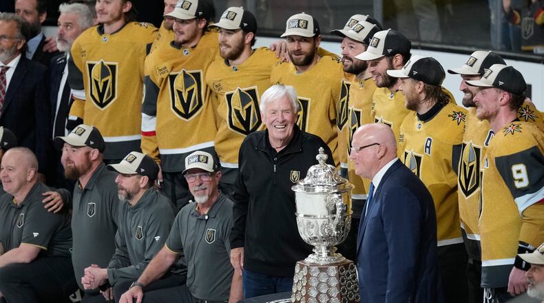 Vegas Golden Knights owner Bill Foley, middle, celebrate after winning Game 4 of the Western Conference finals NHL hockey Stanley Cup playoff series against the Colorado Avalanche Tuesday, May 26, 2026, in Las Vegas. (AP Photo/John Locher)