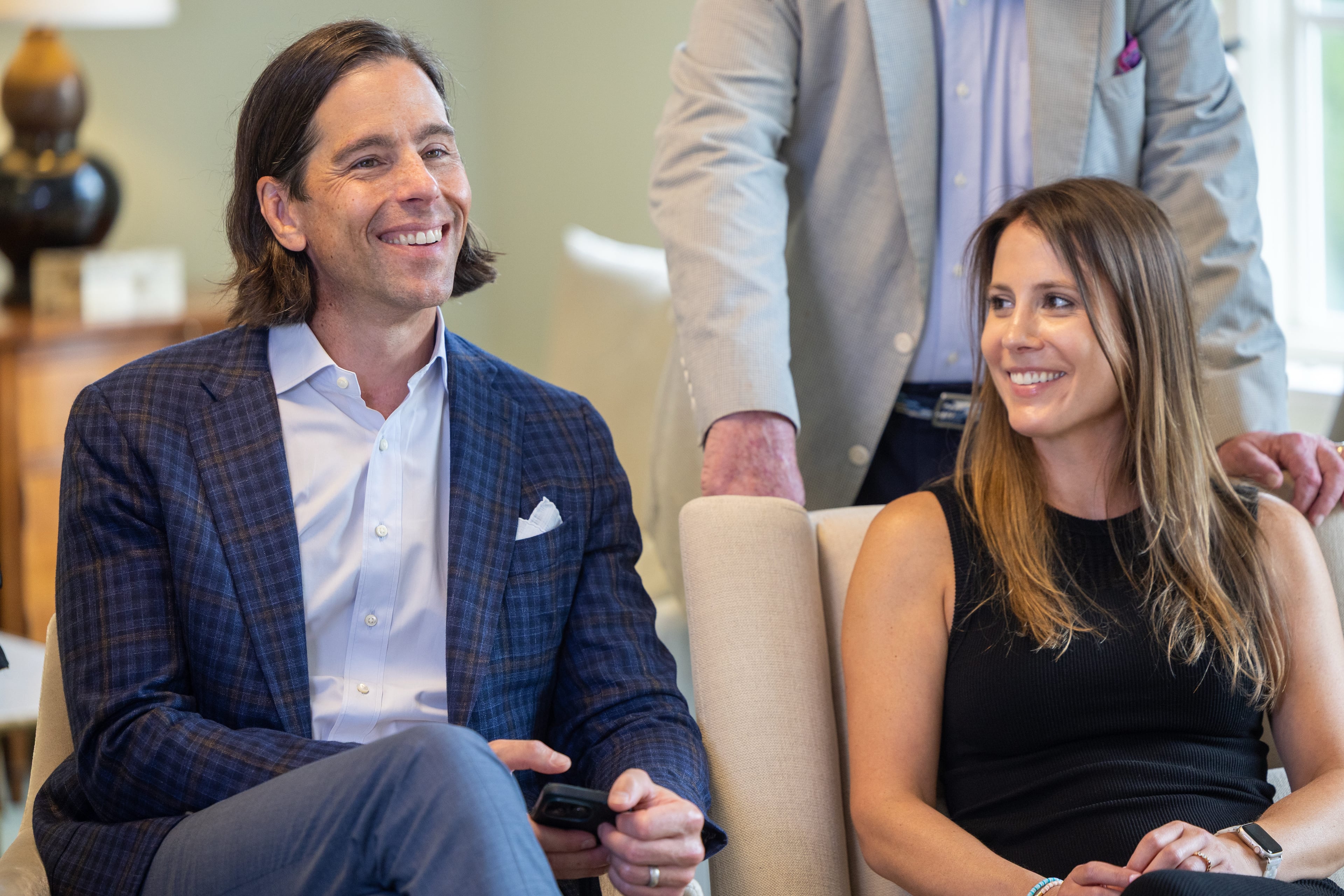 Dorsey Alston Realtors President Michael M. Rogers (left) and employee Kristen Gordon in June at the company's headquarters in Buckhead. (Phil Skinner for the AJC)