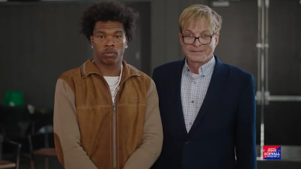 Fulton County Superior Court Judge Craig Schwall (right) appeared in a campaign spot alongside rapper Lil Baby this week. (YouTube screenshot)