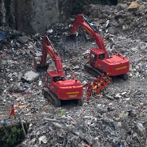 Rescuers work at the site of a landslide in Pengshui County in southwestern China's Chongqing on Sunday, July 19, 2026. (AP Photo/Andy Wong)