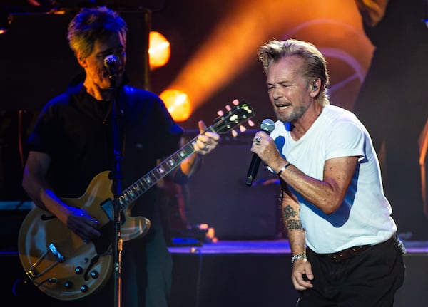 Alpharetta. GA: John Mellencamp visited America Bank Amphitheatre on his Dancing Words tour Saturday night for the first time in 17 years. Mellencamp focused on his greatest hits, sounding robust at age 74. Photo taken Saturday, August 1, 2026 at Ameris Bank Amphitheatre.  (RYAN FLEISHER FOR THE ATLANTA JOURNAL-CONSTITUTION)