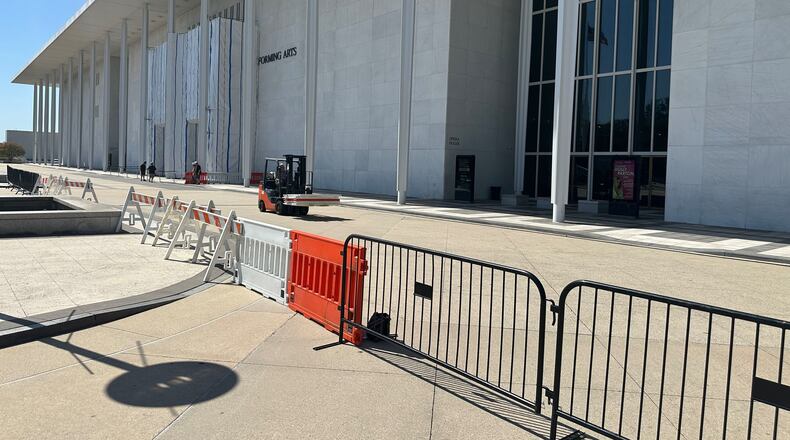 Barriers are placed outside the John F. Kennedy Center for the Performing Arts on Wednesday, Sept. 16, 2026, in Washington. (AP Photo/Nathan Ellgren)
