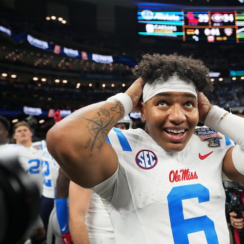 Mississippi quarterback Trinidad Chambliss (6) celebrates after the Sugar Bowl NCAA college football playoff quarterfinal game against Georgia in New Orleans, Thursday, Jan. 1, 2026. (AP Photo/Mathew Hinton)