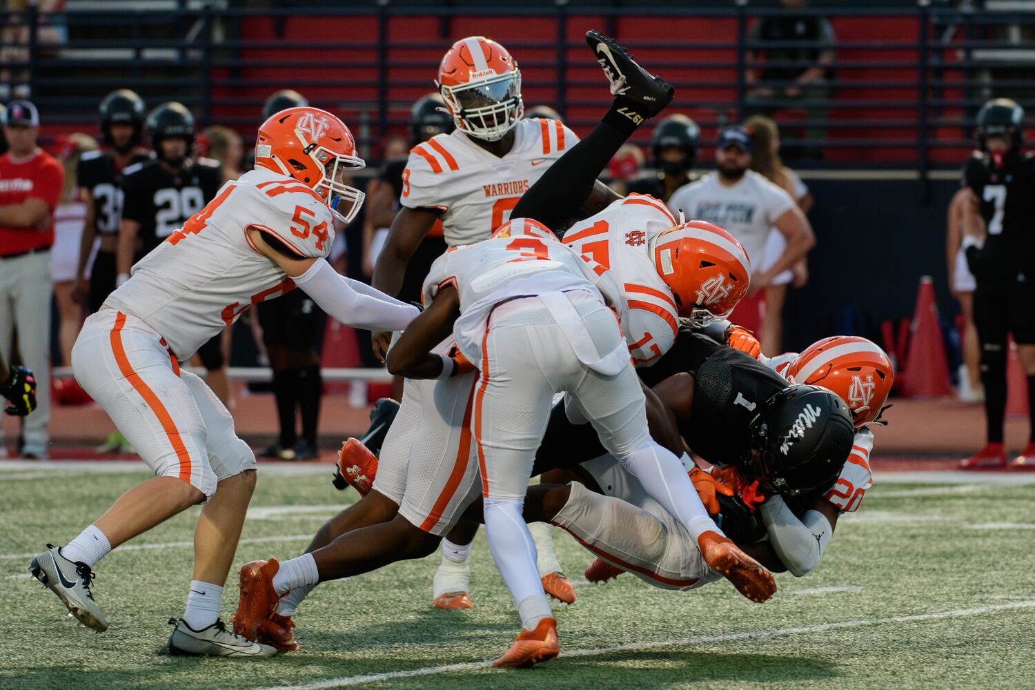 Milton's wide receiver, Debron Gatling, is tackled during their Friday night game at Milton HS, September 22, 2023 (Jamie Spaar for the Atlanta Journal Constitution)