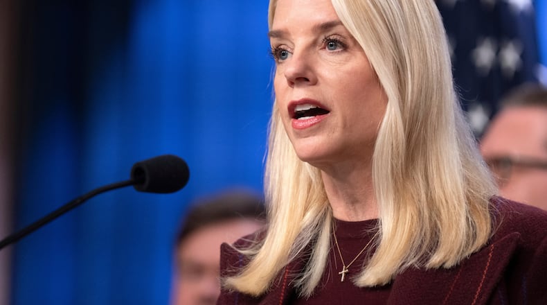 Attorney General Pam Bondi speaks with reporters during a news conference at the Department of Justice, Wednesday, Nov. 19, 2025, in Washington. (AP Photo/Mark Schiefelbein)