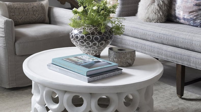 B.D. Jeffries offers an ever-changing mix of stylish home goods, including this neutral palette of grey and taupe linens, a teak Dave mirror, white Duggan coffee table and South African pottery. Contributed by Patrick Heagney Photography