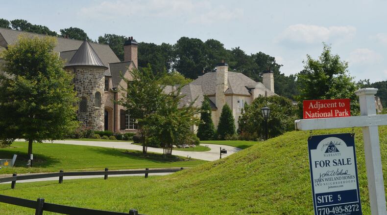 Homes in the Olde Taylor Farms subdivision in Johns Creek. Fulton County commissioners may raise property taxes. KENT D. JOHNSON / AJC FILE PHOTO