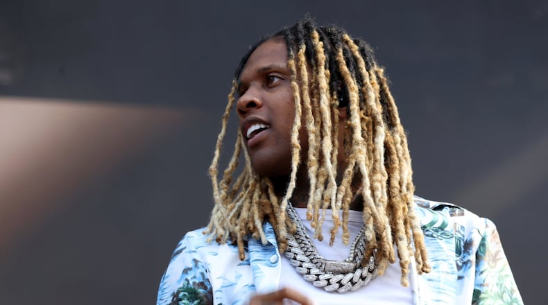Lil Durk performs at Day Three of the Lollapalooza music festival on July 30, 2022, in Chicago's Grant Park. The South Side rapper, a mentor of King Von, is the founder of “Only the Family,” also known as OTF, a hip-hop collective that is linked to the five Chicago people who have been hit with federal charges in California alleging they were contracted to kill rapper Quando Rondo in retaliation for King Von's killing. (Raquel Zaldívar/Chicago Tribune/TNS)