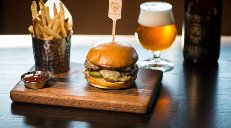 New Realm Brewing The Radegast Burger with White Cheddar, House made Sour Pickles, Special Sauce, Brioche Bun, pictured with Radegast Triple IPA.. Photo credit- Mia Yakel.