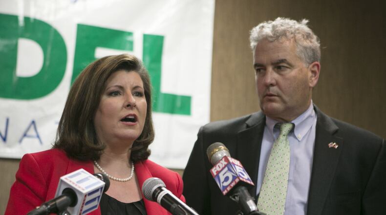 Republican candidate for U.S. Sen. Karen Handel concedes her race with her husband Steve beside her at the end of an election-night watch party Tuesday, May 20, 2014, in Roswell, Ga. (AP Photo/Phil Skinner) 6th District candidate Karen Handel in 2014. AP/Phil Skinner