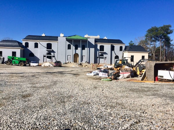 This property used to be a smallish mansion and four acres of trees and landscaping in the Tuxedo Park neighborhood. Now it’s a massive undertaking, the ongoing struggle of infill in Atlanta. Photo by Bill Torpy