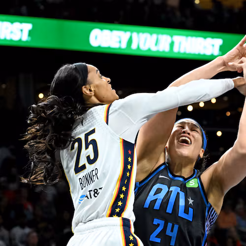 Atlanta Dream forward Brionna Jones fights for a rebound against Indiana Fever forward DeWanna Bonner during the second half in the Dream’s home opener at State Farm Arena, Thursday, May 22, 2025. (Hyosub Shin/AJC)