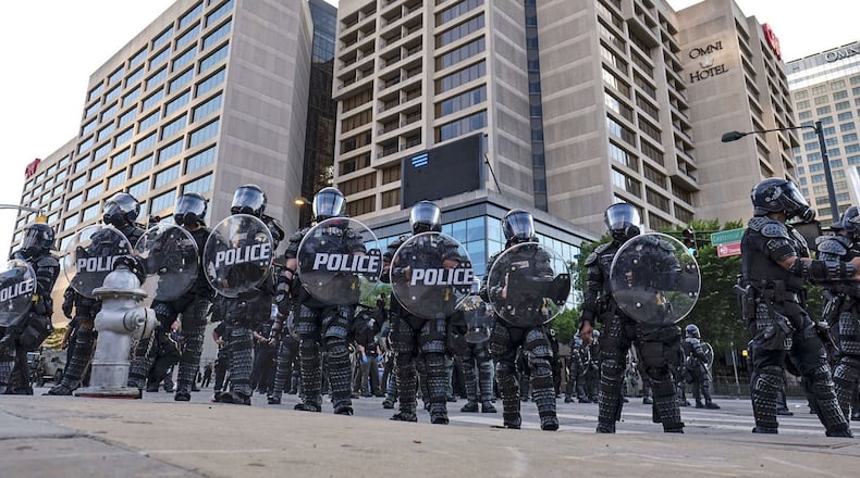There was a heavy police presence around the CNN Center and Centennial Olympic park on May 30, 2020 as protests over the death of George Floyd in Minneapolis police custody continued for a second day. File photo. Ben Gray for the Atlanta Journal-Constitution