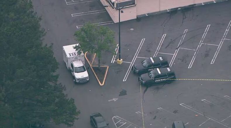 The GBI is investigating after DeKalb County police shot a robbery suspect Wednesday, authorities said.