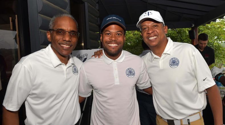 T. Dallas Smith & Co. rented out the College Park Golf Course on Aug. 19 for its founder's birthday, doubling as a charity event. From left to right: COO Dexter Warrior, President Leonte Benton and CEO T. Dallas Smith.