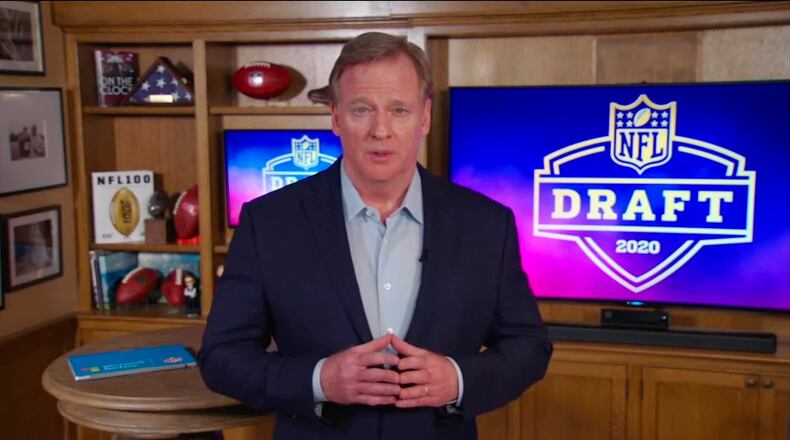 In this still image from video provided by the NFL, commissioner Roger Goodell speaks from his home in Bronxville, N.Y., during the draft Thursday night.